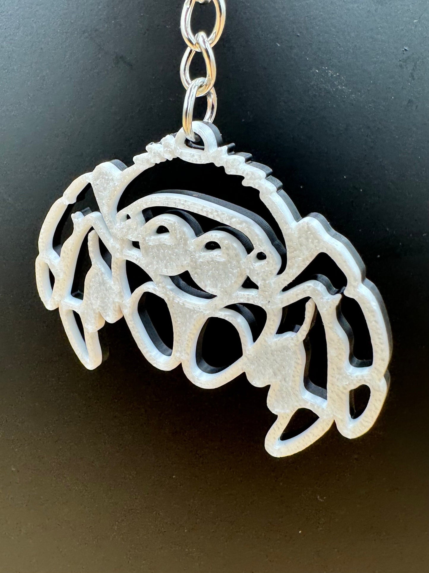 Black/White “switch” double sided Jumping Spider Keychain