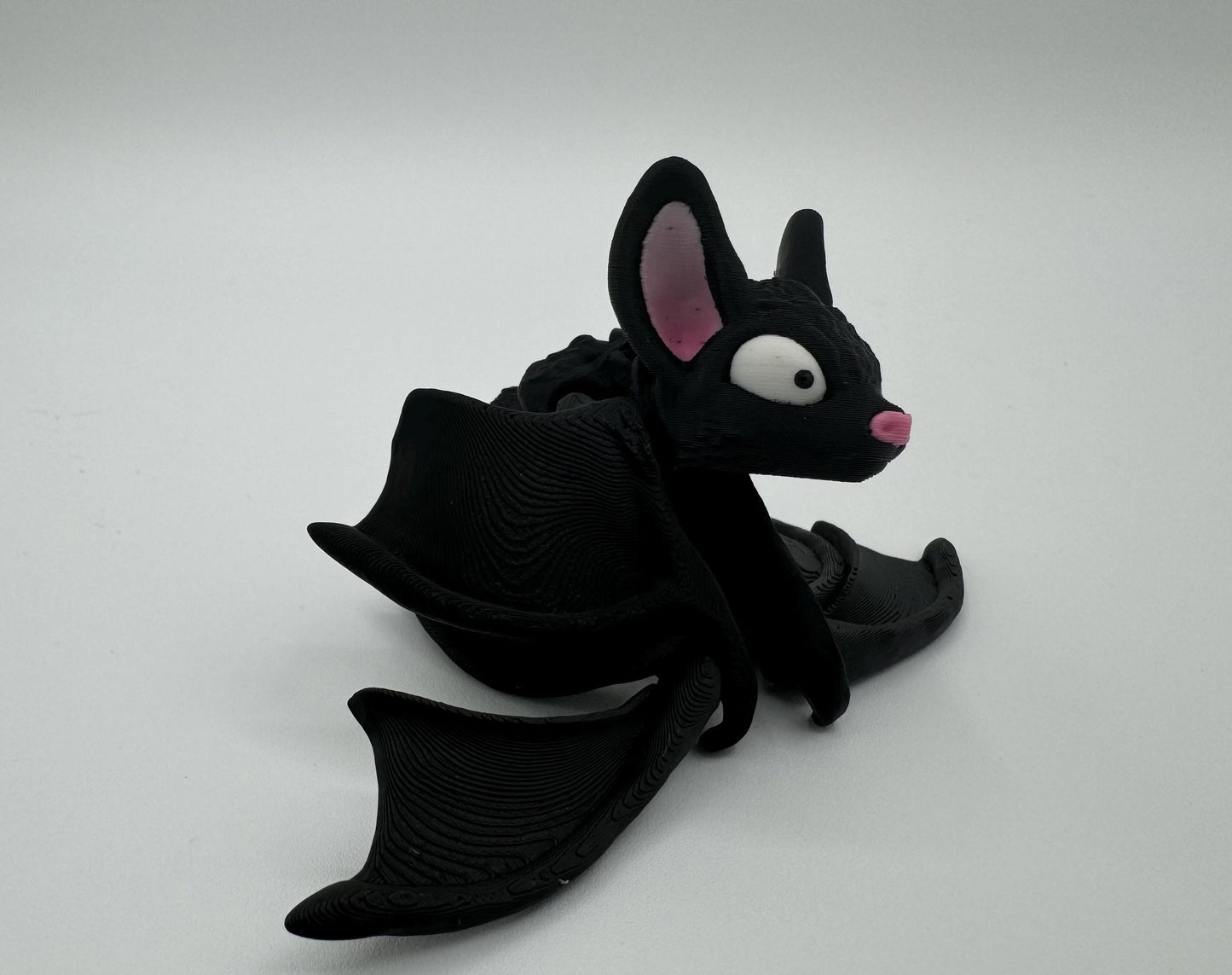 Adorable articulating fidget bat