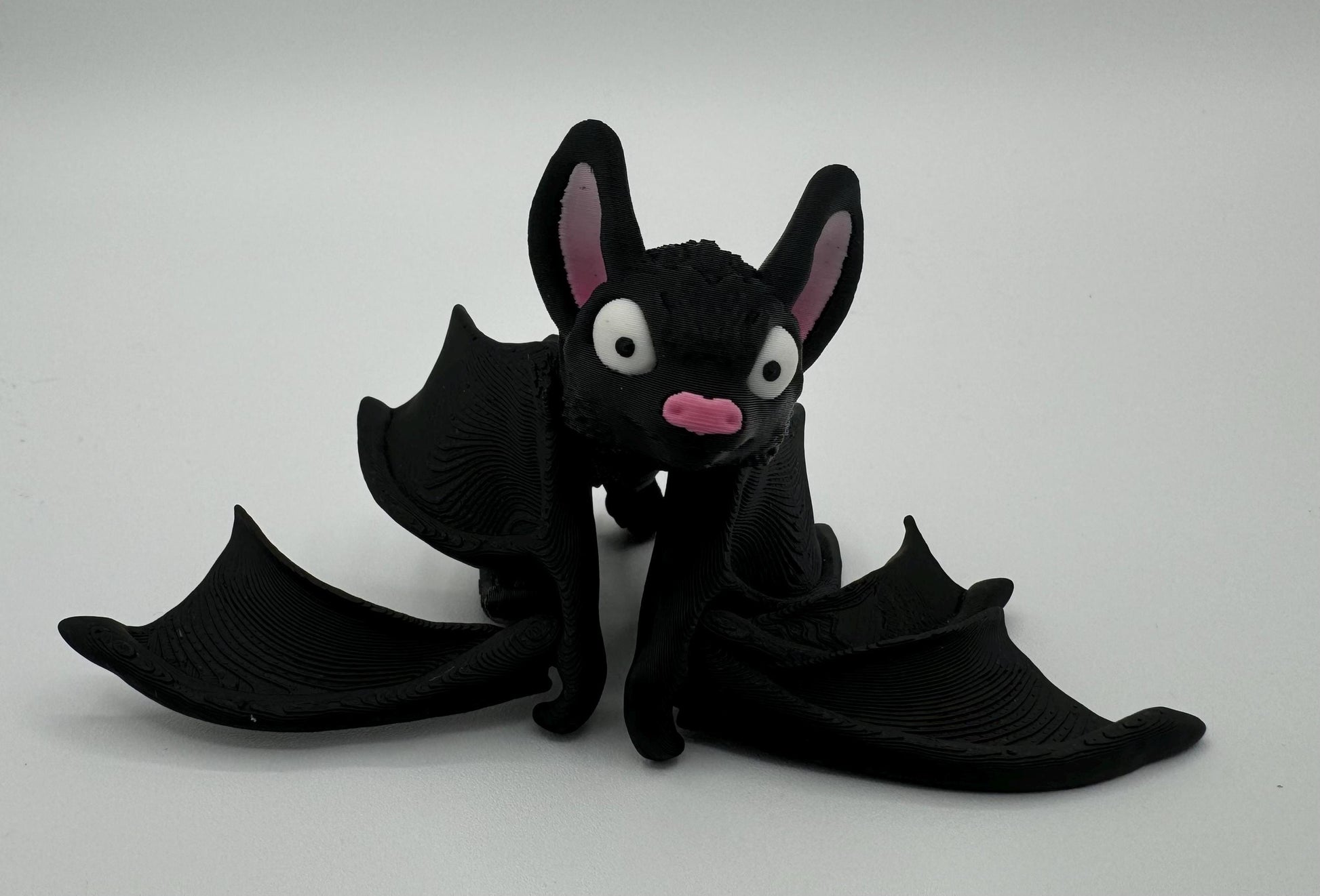 Adorable articulating fidget bat