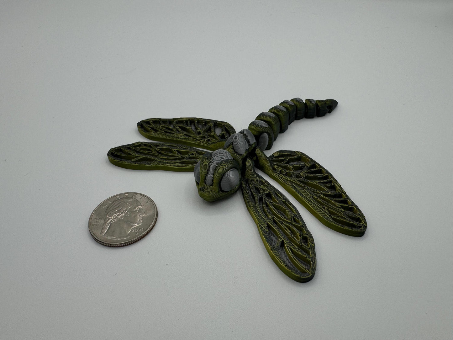 Articulating fidget dragonfly