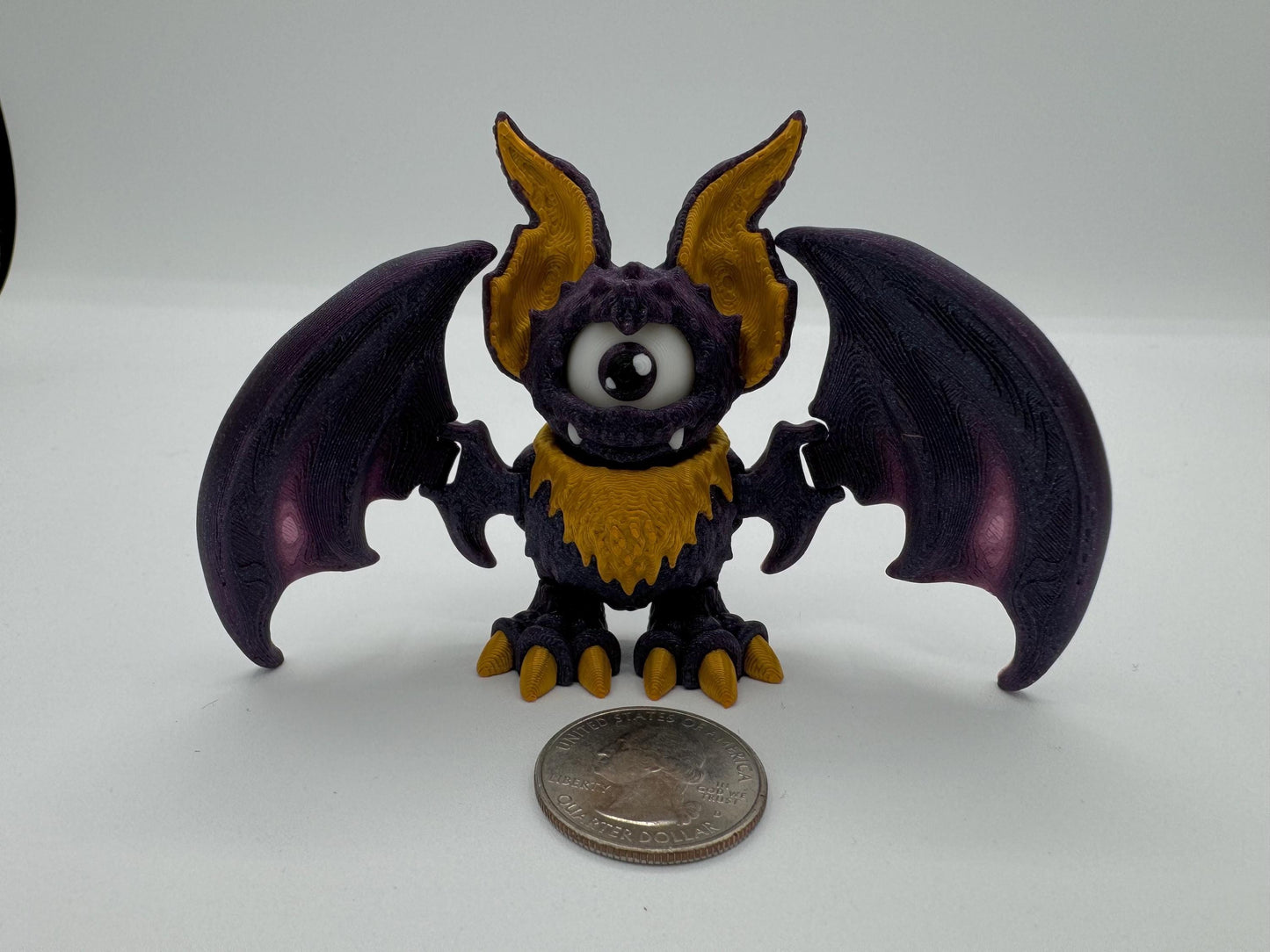 Articulating fidget bat with movable eye