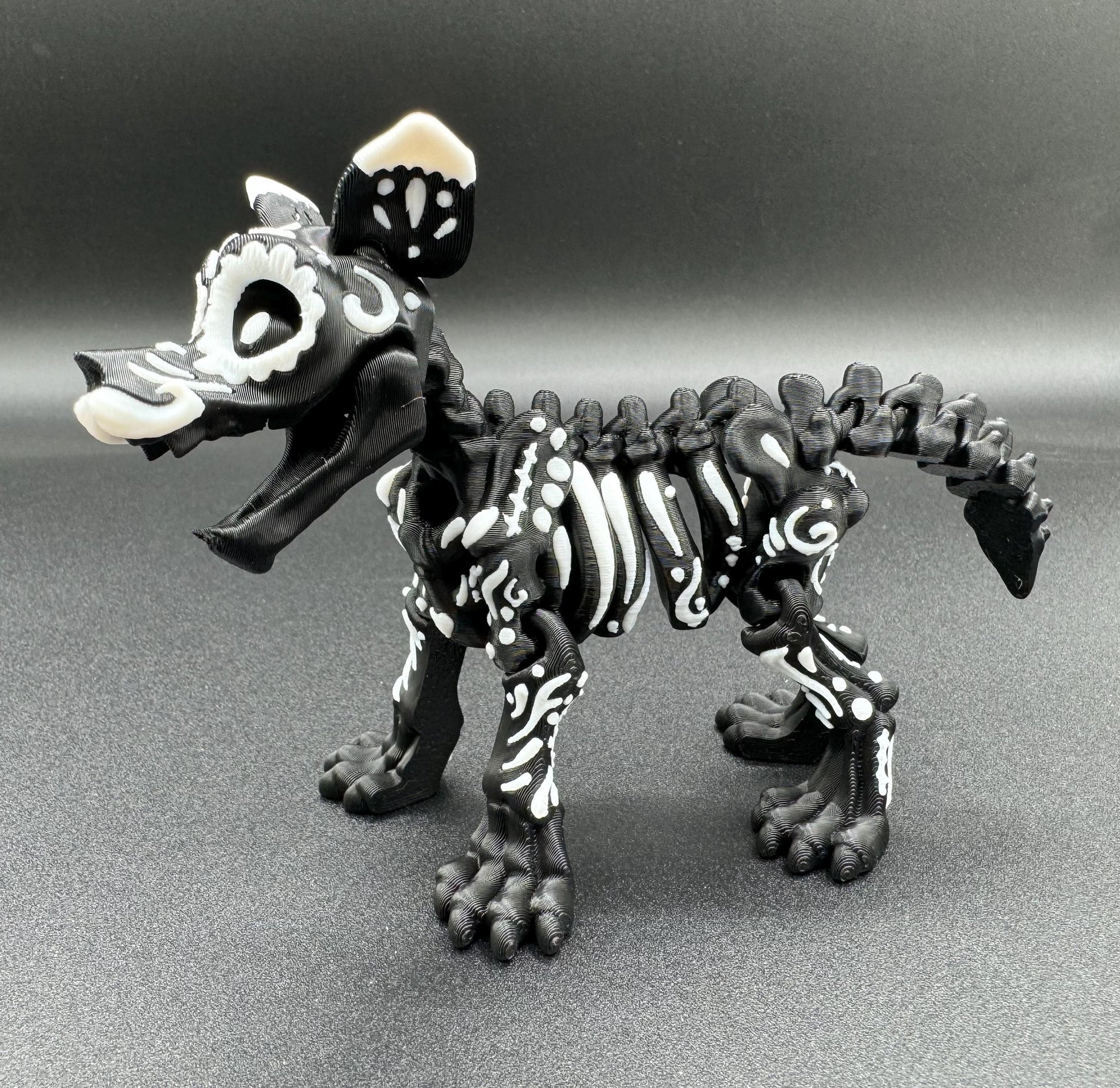 Articulating 3-D printed fidget bone sugar skull animals