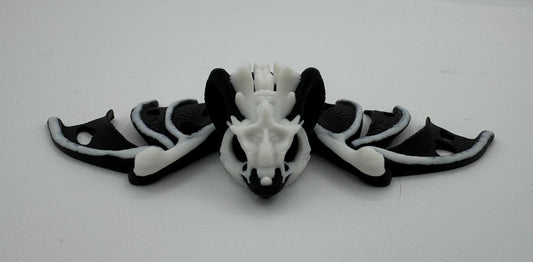 Articulating fidget “hollow bat” toy