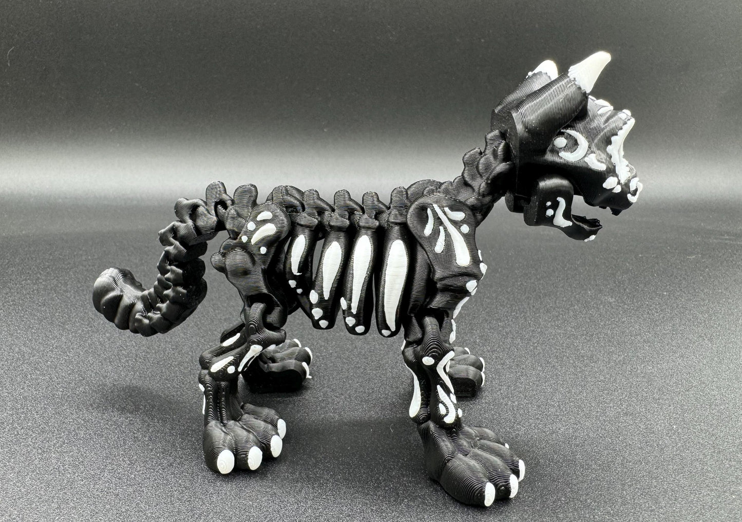 Articulating 3-D printed fidget bone sugar skull animals