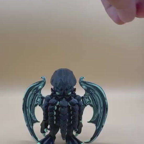 Glow-in-the-dark, 3D printed Articulating “Cthulhu”  Toy